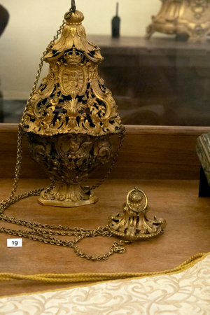 MAFRA, PORTUGAL - 29th JUNE 2022: Close up view of a Golden Censer used by priests for burning incense.のeditorial素材