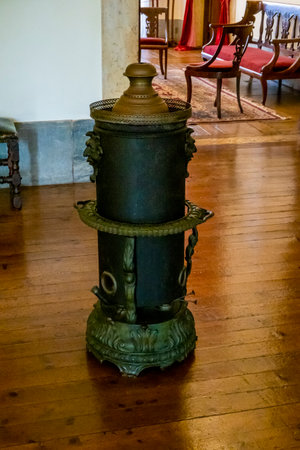 MAFRA, PORTUGAL - 29th JUNE 2022: View of a beautiful and highly detailed antique boiler in display on the Palace of Mafra, Portugal.のeditorial素材