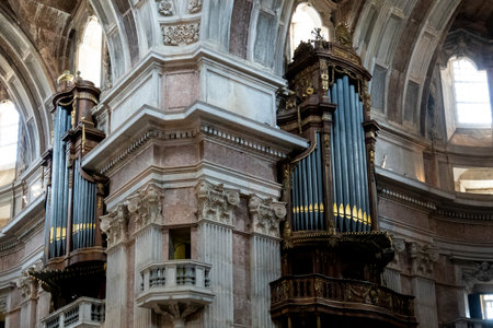 MAFRA, PORTUGAL - 29th JUNE 2022: View of the beautiful pipe organ on the interior of the Cathedral of the Palace of Mafra, Portugal.のeditorial素材