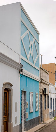 Typical architecture of Algarve rustic buildings with intricate designs of platbands.