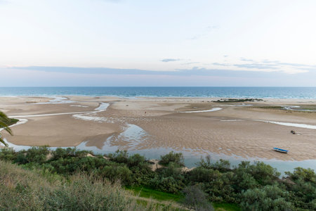 Landscape view to the beach and ocean from Cacela Velha village, located in the Algarve region, Portugal.の写真素材