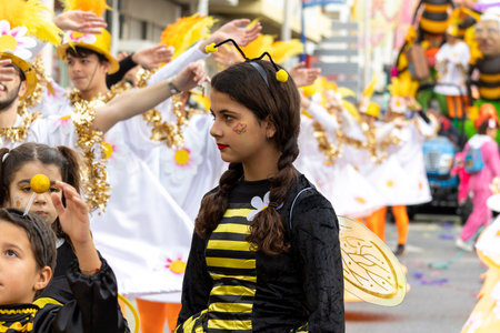 LOULE, PORTUGAL - 20th FEBRUARY 2023: Colorful Carnival (Carnaval) Parade festival participants on Loule city, Portugal.のeditorial素材