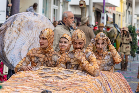 LOULE, PORTUGAL - 20th FEBRUARY 2023: Colorful Carnival (Carnaval) Parade festival participants on Loule city, Portugal.のeditorial素材