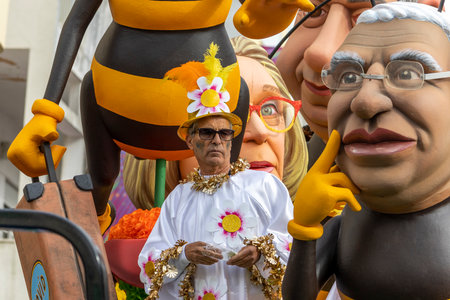 LOULE, PORTUGAL - 20th FEBRUARY 2023: Colorful Carnival (Carnaval) Parade festival participants on Loule city, Portugal.のeditorial素材