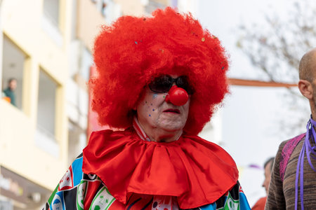 LOULE, PORTUGAL - 20th FEBRUARY 2023: Colorful Carnival (Carnaval) Parade festival participants on Loule city, Portugal.のeditorial素材