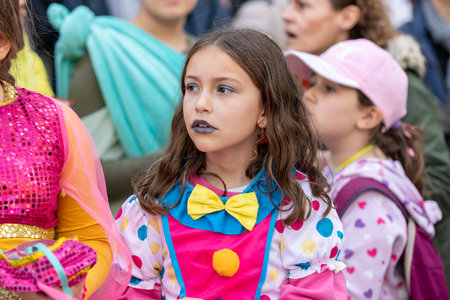 LOULE, PORTUGAL - 20th FEBRUARY 2023: Colorful Carnival (Carnaval) Parade festival participants on Loule city, Portugal.のeditorial素材
