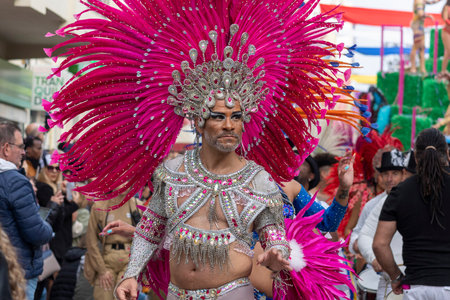 LOULE, PORTUGAL - 20th FEBRUARY 2023: Colorful Carnival (Carnaval) Parade festival participants on Loule city, Portugal.のeditorial素材