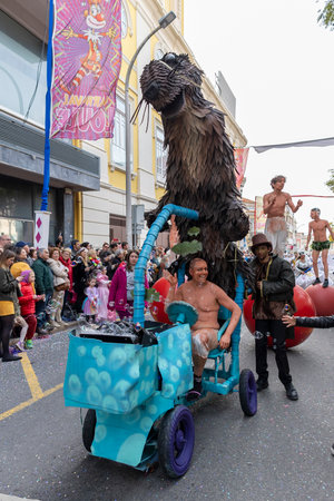 LOULE, PORTUGAL - 20th FEBRUARY 2023: Colorful Carnival (Carnaval) Parade festival participants on Loule city, Portugal.のeditorial素材