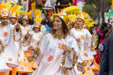 LOULE, PORTUGAL - 20th FEBRUARY 2023: Colorful Carnival (Carnaval) Parade festival participants on Loule city, Portugal.のeditorial素材
