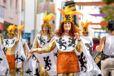 LOULE, PORTUGAL - 23rd FEBRUARY 2023: Colorful Carnival (Carnaval) Parade festival participants on...