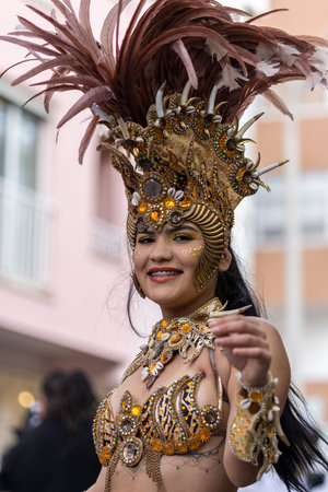 LOULE, PORTUGAL - 23rd FEBRUARY 2023: Colorful Carnival (Carnaval) Parade festival participants on...
