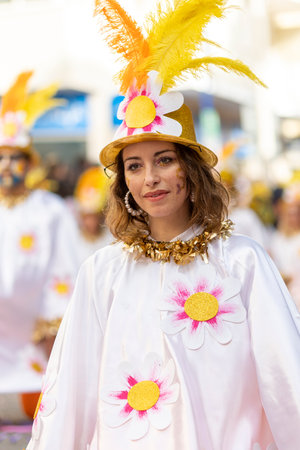 LOULE, PORTUGAL - 23rd FEBRUARY 2023: Colorful Carnival (Carnaval) Parade festival participants on Loule city, Portugal.のeditorial素材