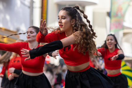 LOULE, PORTUGAL - 23rd FEBRUARY 2023: Colorful Carnival (Carnaval) Parade festival participants on Loule city, Portugal.のeditorial素材