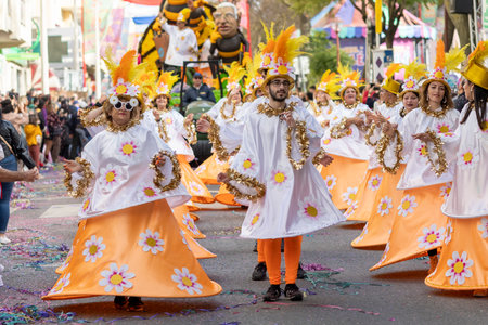 LOULE, PORTUGAL - 23rd FEBRUARY 2023: Colorful Carnival (Carnaval) Parade festival participants on Loule city, Portugal.のeditorial素材