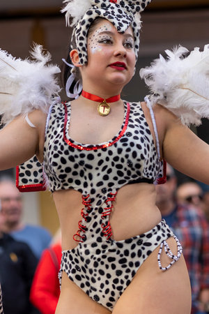 LOULE, PORTUGAL - 23rd FEBRUARY 2023: Colorful Carnival (Carnaval) Parade festival participants on Loule city, Portugal.のeditorial素材