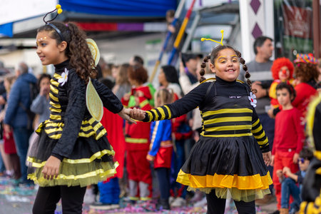 LOULE, PORTUGAL - 23rd FEBRUARY 2023: Colorful Carnival (Carnaval) Parade festival participants on Loule city, Portugal.のeditorial素材