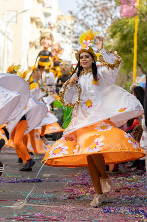 LOULE, PORTUGAL - 23rd FEBRUARY 2023: Colorful Carnival (Carnaval) Parade festival participants on Loule city, Portugal.のeditorial素材