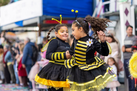 LOULE, PORTUGAL - 23rd FEBRUARY 2023: Colorful Carnival (Carnaval) Parade festival participants on Loule city, Portugal.のeditorial素材