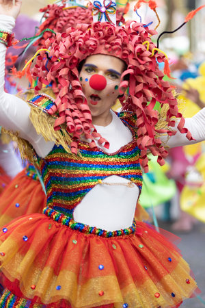 LOULE, PORTUGAL - 23rd FEBRUARY 2023: Colorful Carnival (Carnaval) Parade festival participants on Loule city, Portugal.のeditorial素材
