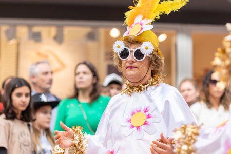 LOULE, PORTUGAL - 23rd FEBRUARY 2023: Colorful Carnival (Carnaval) Parade festival participants on...