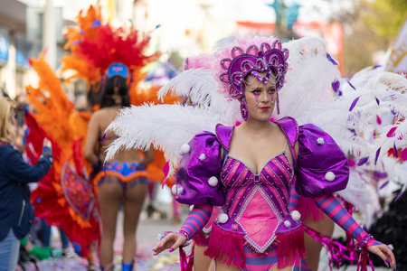 LOULE, PORTUGAL - 23rd FEBRUARY 2023: Colorful Carnival (Carnaval) Parade festival participants on Loule city, Portugal.のeditorial素材