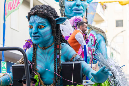 LOULE, PORTUGAL - 23rd FEBRUARY 2023: Colorful Carnival (Carnaval) Parade festival participants on Loule city, Portugal.のeditorial素材