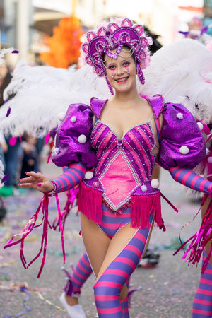 LOULE, PORTUGAL - 23rd FEBRUARY 2023: Colorful Carnival (Carnaval) Parade festival participants on Loule city, Portugal.のeditorial素材
