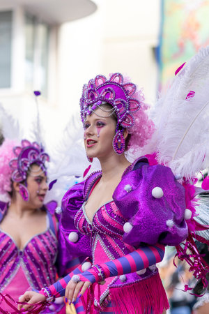 LOULE, PORTUGAL - 23rd FEBRUARY 2023: Colorful Carnival (Carnaval) Parade festival participants on Loule city, Portugal.のeditorial素材