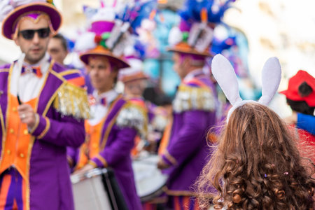 LOULE, PORTUGAL - 23rd FEBRUARY 2023: Colorful Carnival (Carnaval) Parade festival participants on Loule city, Portugal.のeditorial素材