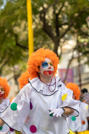 LOULE, PORTUGAL - 23rd FEBRUARY 2023: Colorful Carnival (Carnaval) Parade festival participants on Loule city, Portugal.のeditorial素材