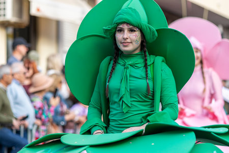LOULE, PORTUGAL - 23rd FEBRUARY 2023: Colorful Carnival (Carnaval) Parade festival participants on Loule city, Portugal.のeditorial素材