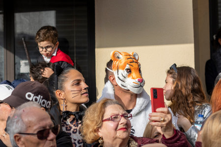 LOULE, PORTUGAL - 23rd FEBRUARY 2023: Colorful Carnival (Carnaval) Parade festival participants on Loule city, Portugal.のeditorial素材