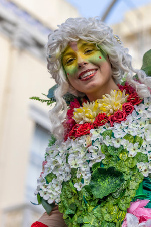 LOULE, PORTUGAL - 23rd FEBRUARY 2023: Colorful Carnival (Carnaval) Parade festival participants on Loule city, Portugal.のeditorial素材