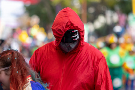 LOULE, PORTUGAL - 23rd FEBRUARY 2023: Colorful Carnival (Carnaval) Parade festival participants on Loule city, Portugal.のeditorial素材