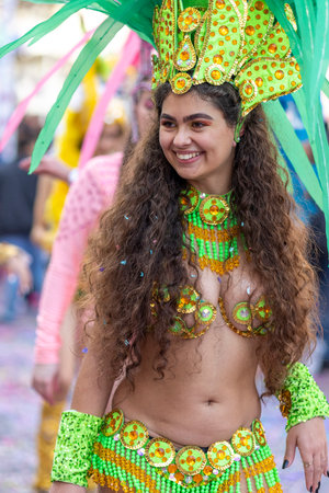 LOULE, PORTUGAL - 23rd FEBRUARY 2023: Colorful Carnival (Carnaval) Parade festival participants on Loule city, Portugal.のeditorial素材