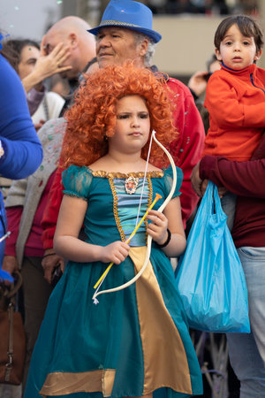 LOULE, PORTUGAL - 23rd FEBRUARY 2023: Colorful Carnival (Carnaval) Parade festival participants on Loule city, Portugal.のeditorial素材