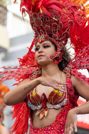 LOULE, PORTUGAL - 23rd FEBRUARY 2023: Colorful Carnival (Carnaval) Parade festival participants on Loule city, Portugal.のeditorial素材