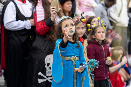 LOULE, PORTUGAL - 23rd FEBRUARY 2023: Colorful Carnival (Carnaval) Parade festival participants on Loule city, Portugal.のeditorial素材