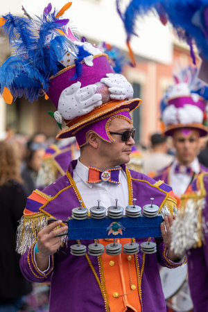 LOULE, PORTUGAL - 23rd FEBRUARY 2023: Colorful Carnival (Carnaval) Parade festival participants on Loule city, Portugal.のeditorial素材