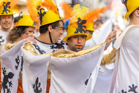 LOULE, PORTUGAL - 23rd FEBRUARY 2023: Colorful Carnival (Carnaval) Parade festival participants on...