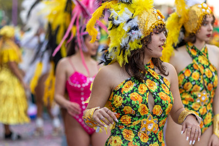 LOULE, PORTUGAL - 23rd FEBRUARY 2023: Colorful Carnival (Carnaval) Parade festival participants on...