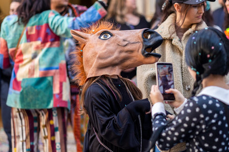 LOULE, PORTUGAL - 23rd FEBRUARY 2023: Colorful Carnival (Carnaval) Parade festival participants on Loule city, Portugal.のeditorial素材