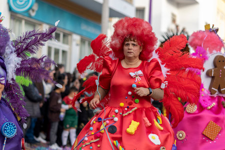 LOULE, PORTUGAL - 23rd FEBRUARY 2023: Colorful Carnival (Carnaval) Parade festival participants on Loule city, Portugal.のeditorial素材