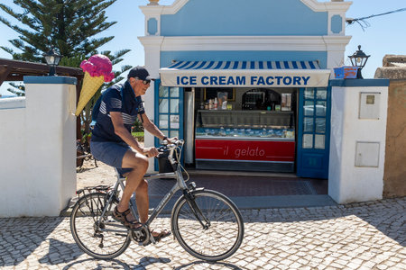LUZ, PORTUGAL, 16th APRIL 2023: Beautiful little ice cream shop located at Luz beach in Lagos region, Algarve, Portugal.のeditorial素材