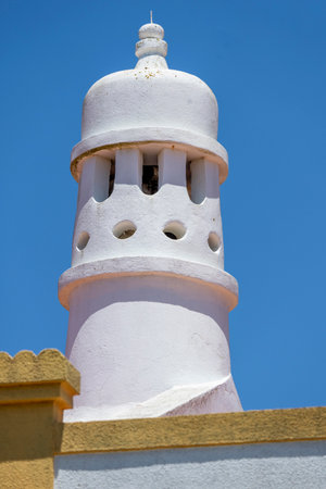 Close view of the typical Algarve chimney in Portugal.の写真素材