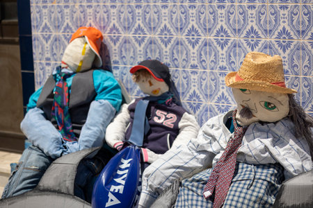 SANTA RITA, PORTUGAL - MAY 1st, 2023: ancient tradition of handmade dolls called maios / maias, celebrating the arrival of spring, located on the algarve region, the south of portugal.のeditorial素材