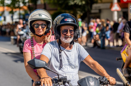 FARO, PORTUGAL - 24th JULY, 2023: Parade of several motorcyclists on the road for the 41st International Motorcycle Festival as a goodbye for the next year. There are nationalities from all over the world that participate and is considered one of the bestのeditorial素材