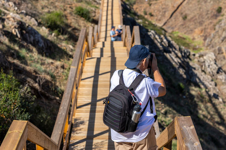 Wooden path on the mountain ideal for nature walks, located near Alferce village, Portugal.の写真素材