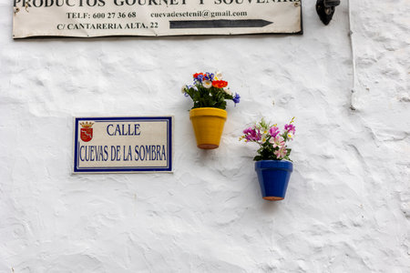 Setenil de las Bodegas, Spain - October 20, 2023: Typical potted plants on Spanish pueblos or villages, located in Andalusia, Spain.のeditorial素材