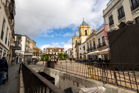 Ronda, Spain - October 20, 2023: Typical streets of Ronda village with many restaurants, coffee shops, stores and movement., located in Spain.のeditorial素材